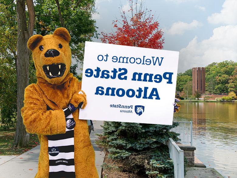 The Nittany Lion mascot holding up a sign reading Welcome to <a href='http://3xtg.followyournosehere.com'>十大网投平台信誉排行榜</a>阿尔图纳分校